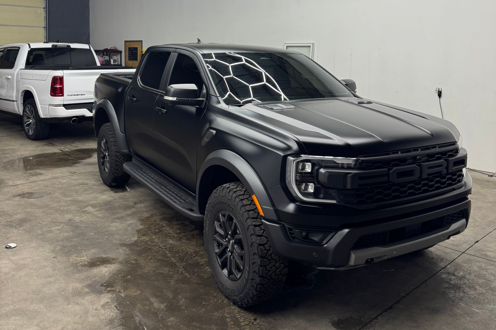 Black Ford truck in the Good Vibes climate-controlled studio